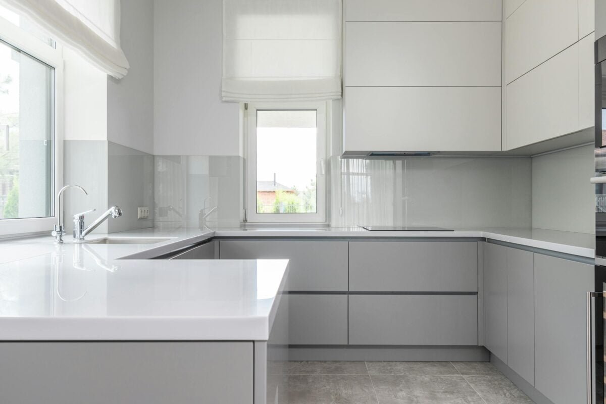 Contemporary kitchen with minimal white interior - decluttering quick wins