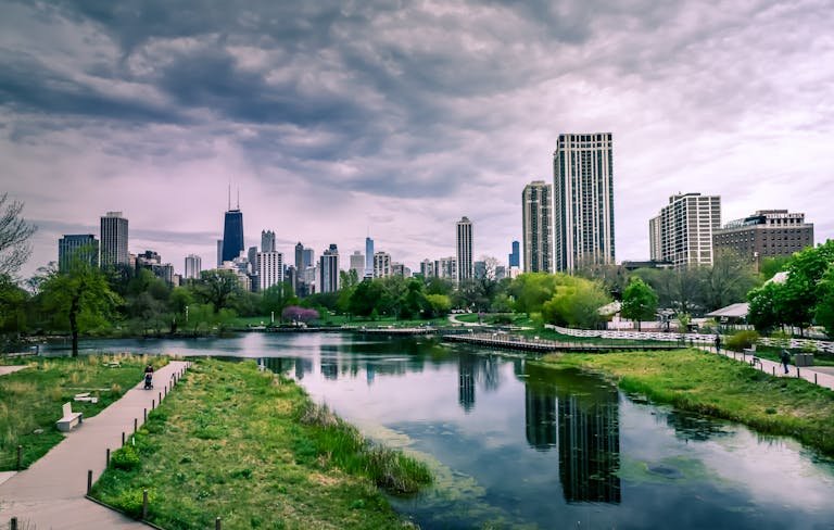 River Near City Buildings Under Cloudy Sky - Earthing opportunities are everywhere